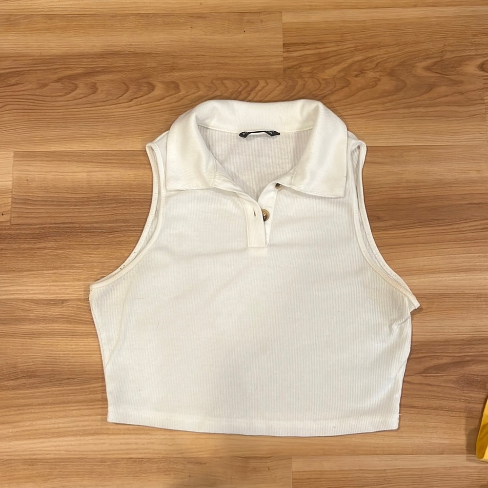 White, size M, crop top (not to short), not super see through